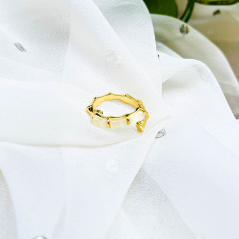 Minimal Snake Charm Ring – White Enamel Segments & Gold Bamboo-Inspired Base